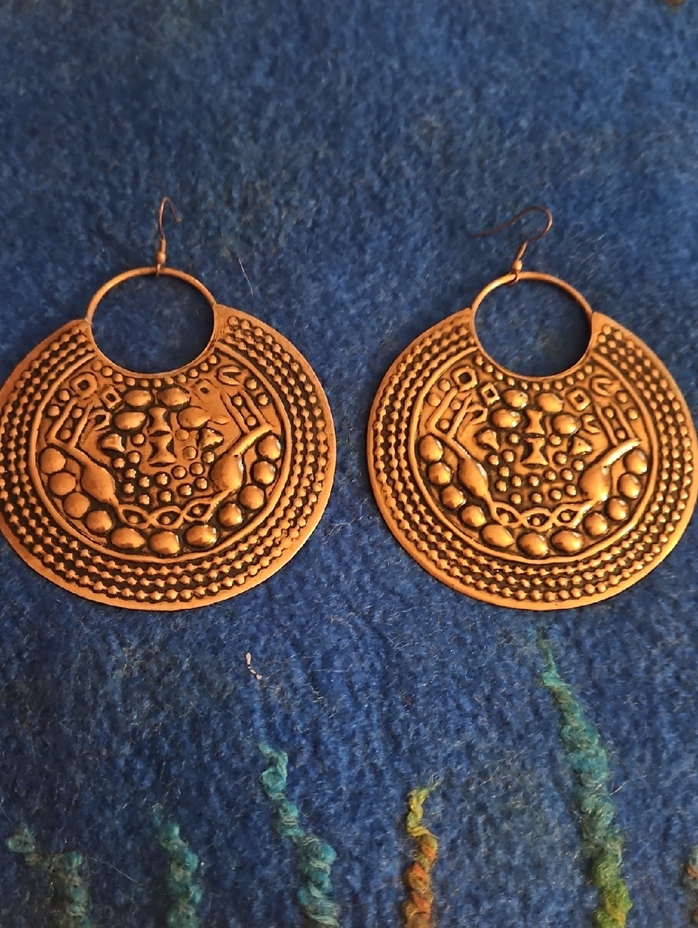 3 For $15 Gold-Tone Textured Disc Hoop Earrings.